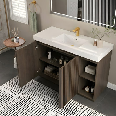 Freestanding storage cabinet with integrated quartz sink