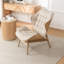Fauteuil à oreilles capitonné Jeyshan-1672650429