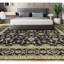 Tapis noir et doré de haute qualité noué à la main