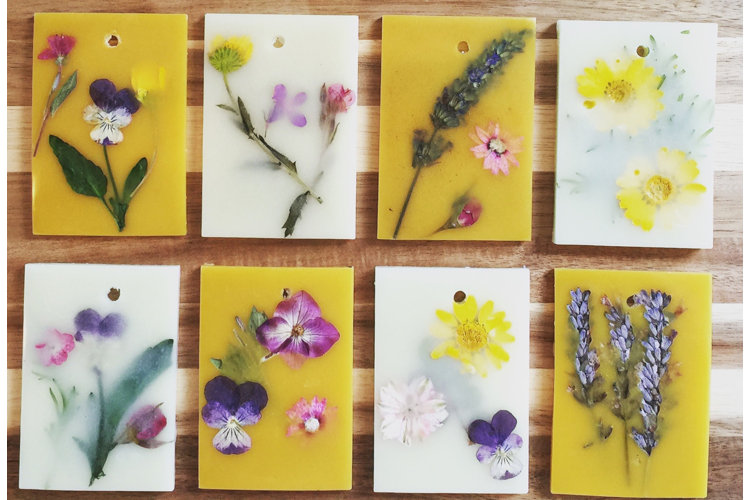 Board with scented floral wax tablets home decor.