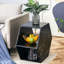 Table basse hexagonale avec aspect marbre noir, rangement multi-trous, design épuré et moderne, options de couleurs disponibles