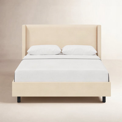 Hanson Upholstered Wingback Platform Bed