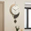 Horloge murale décorative asymétrique en bois pâle-1966576322