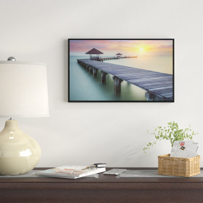 Reproduction photographique sur toile tendue avec châssis « Wooden Sea Bridge and Sunset »