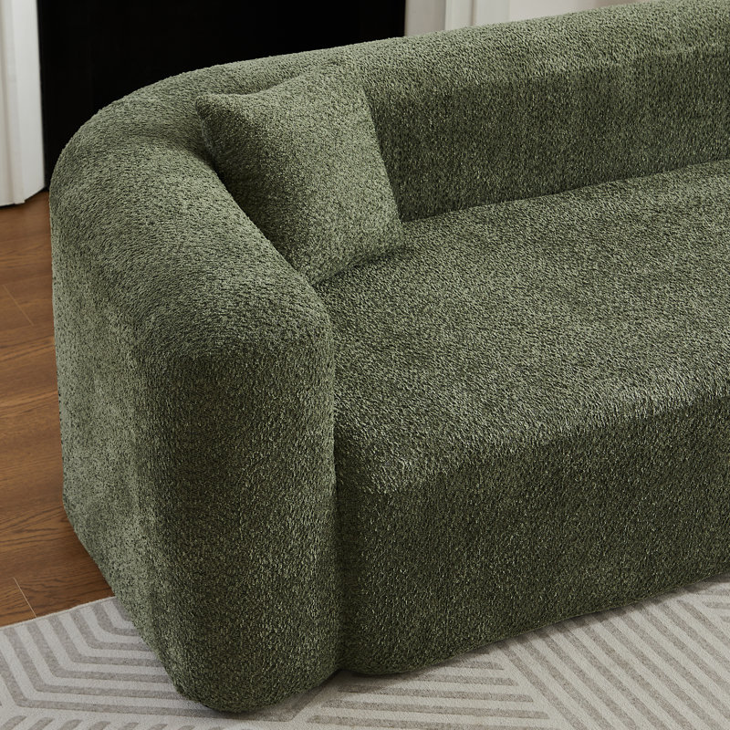 Canapé modulaire modulaire en L avec dossier incurvé, tissu chenille et confort moelleux pour les espaces de vie modernes.