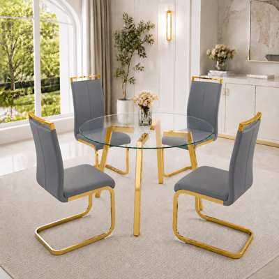 Modern Glam 5-Piece Round Tempered Glass Dining Table Set with Gold Base and Cantilever Chairs