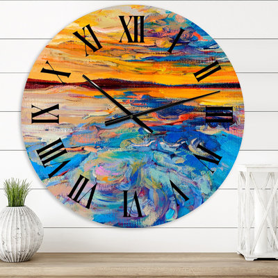 Orange coucher de soleil sur des vagues bleues - horloge murale nautique et côtière