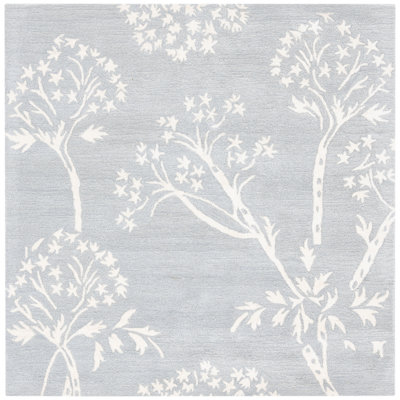 Hodgson Hand Tufted Wool/Viscose Floral Rug in Blue/Ivory