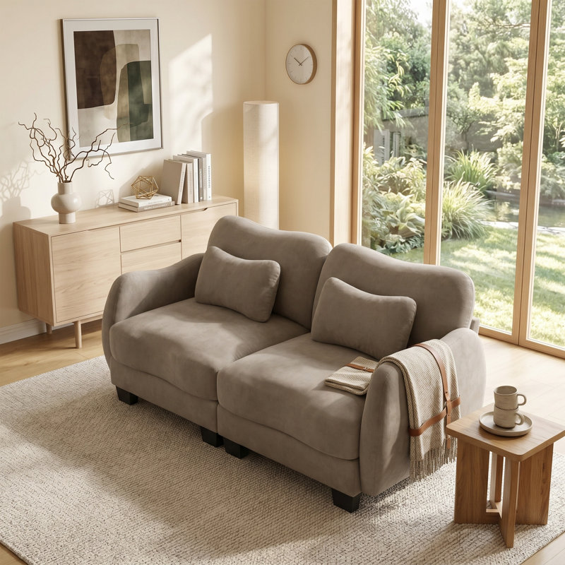 Canapé en chenille Cloud-Comfort avec courbes ergonomiques et coussin lombaire délicat - un soutien moderne et élégant pour les salons