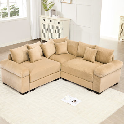 Canapé d'angle convertible modulable Cloud 3 places surdimensionné, avec assise profonde, extra large et épaisse, 10 coussins en velours côtelé, design ergonomique pour les espaces de vie aux tons camel et les pièces aux tons neutres