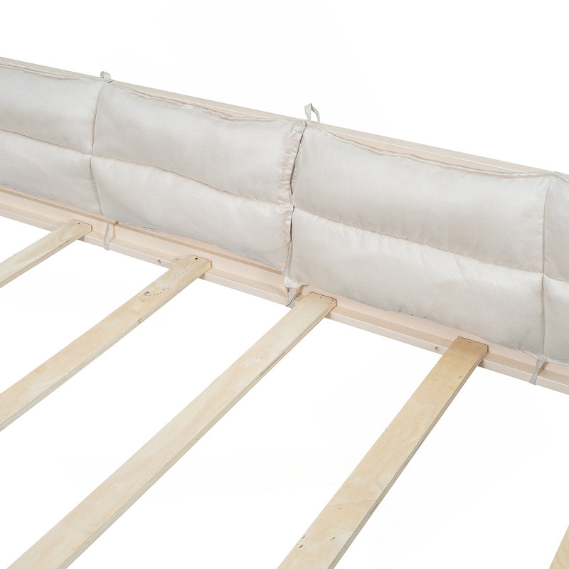 Lit tapissier en bois avec garde-corps et coussin Laclair