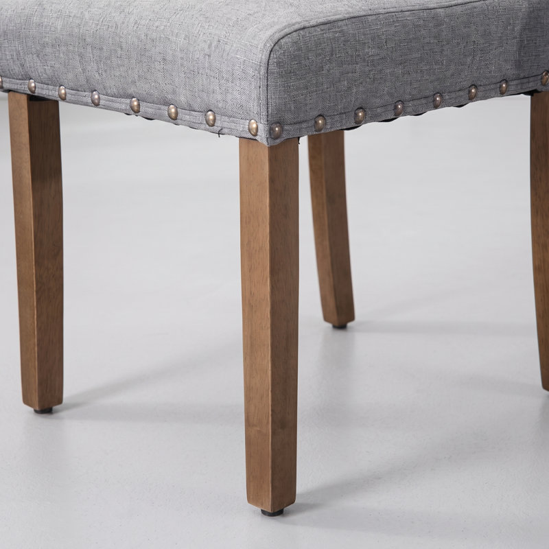 Chaises de cuisine rembourrées élégantes en lin Rucha avec pieds robustes en bois d'hévéa et garniture cloutée, Gris