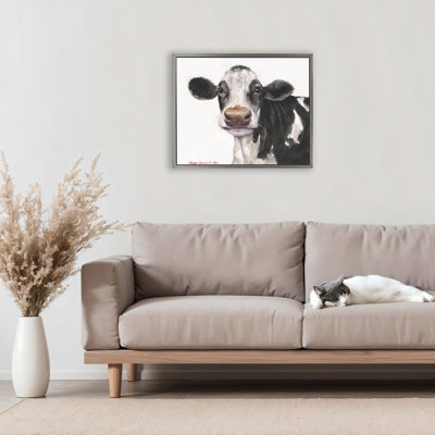 Mignonne vache avec cadre flottant à taches blanches, design par George Dyachenko