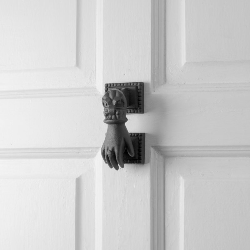 Heurtoir de porte en fonte