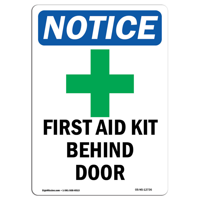 First Aid Kit Behind Sign