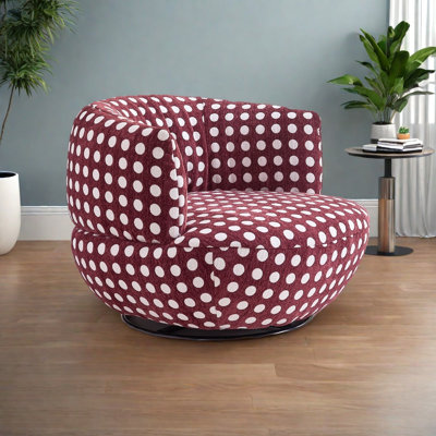 Fauteuil rotatif confortable à pois
