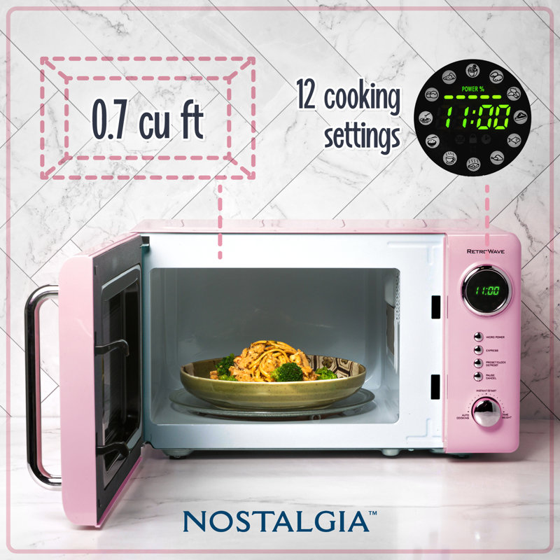 Nostalgia 0.7 Cubic Feet Countertop Microwave, Pink