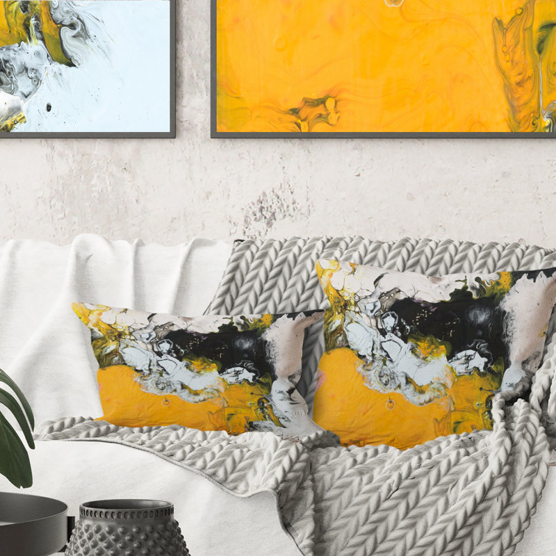 Coussin jaune jaune, noir et blanc