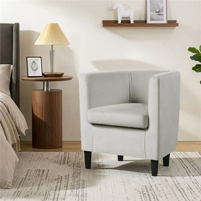 Fauteuil en velours revêtu de tonneau