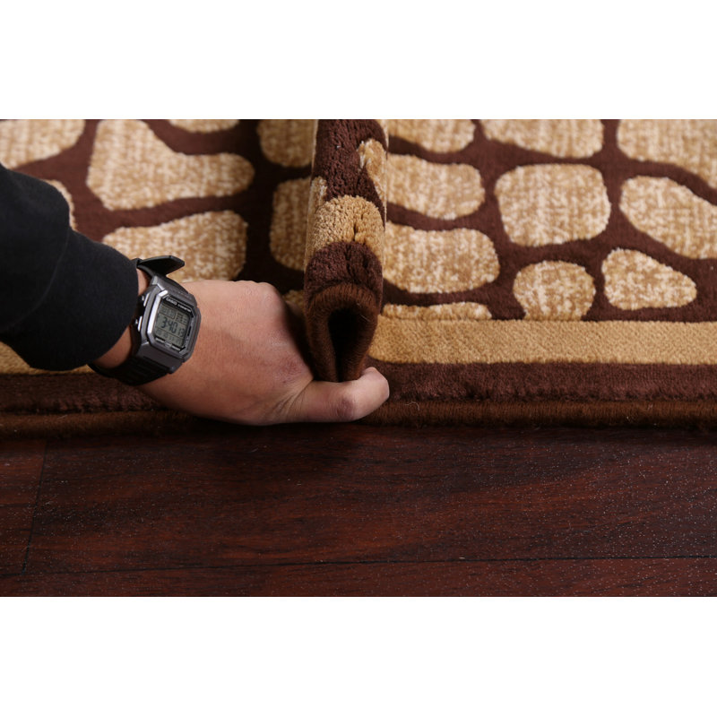 Tapis de couloir à motif géométrique brun
