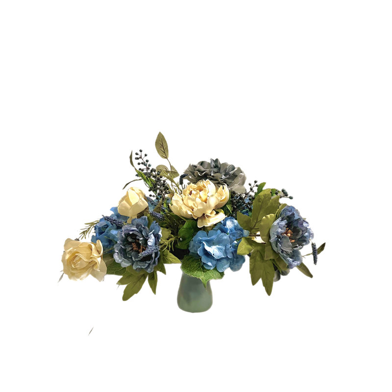 Arrangement mixte dans un vase