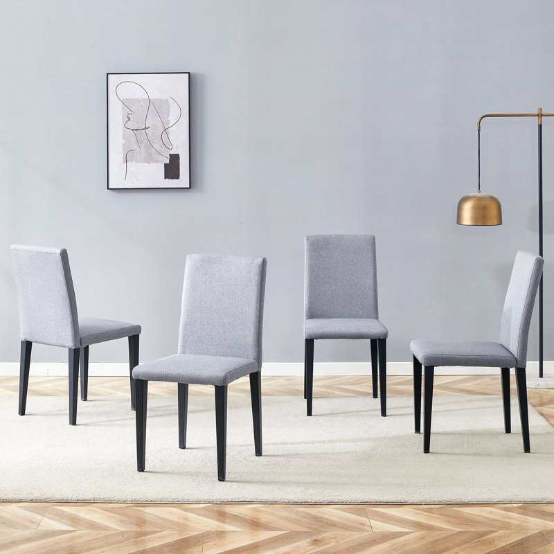 Chaises de salle à manger confortables en lin et coton avec une simplicité moderne pour des espaces de salle à manger élégants