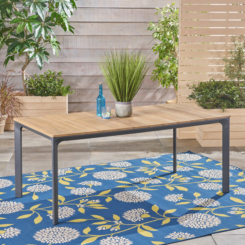 Amini Wooden Dining Table Mix and match with other dining sets or create a whole new set with this table
