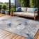 Chartier Machine Woven Floral Area Rug