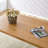 Modern minimalist white dining table, striped MDF tabletop-111697936