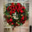 Red and Gold Holiday Wreath with Ornaments and Pine Cones