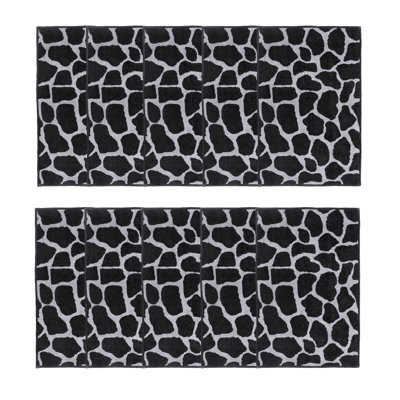 Ensemble de tapis touffetés en nylon à motif animalier noir / blanc Benjamin