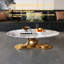 Table basse en métal doré avec piédestal en acier inoxydable et plateau en faux marbre