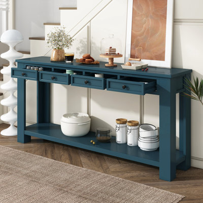 Console élégante en bois massif, fini bleu foncé, idéale pour une entrée. Elle offre des options de rangement.