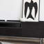 Meuble télé en bois massif noir au design simple