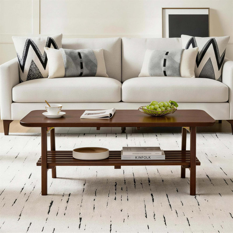 Table basse pliable peu encombrante avec rangement à deux niveaux