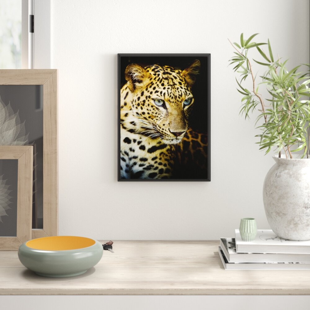 Gerahmtes Wandbild Leopard mit blauen Augen