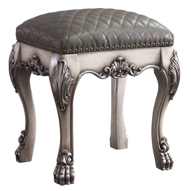 Tabouret de coiffeuse élégant en gris et blanc os rétro pour une chambre à coucher sereine et luxueuse
