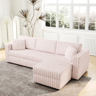 Doux modulaire rose avec relevage hydraulique et housses de coussin lavables de 106,3 po en rose. Pour un rangement pratique. Matériaux et coussins de qualité. Convient à différents espaces. Housses amovibles. Ameublement moderne