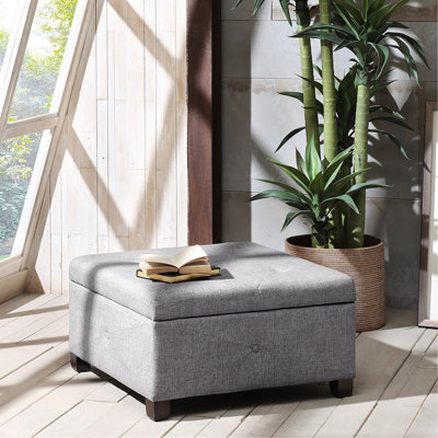 Pouf de rangement à fermeture en douceur