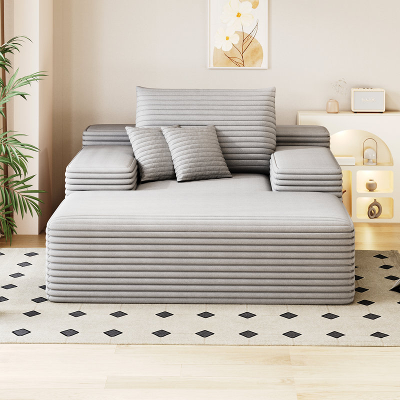 Chaise longue surdimensionnée en fausse fourrure moelleuse, idéale pour une détente confortable et un décor de salon élégant, gris