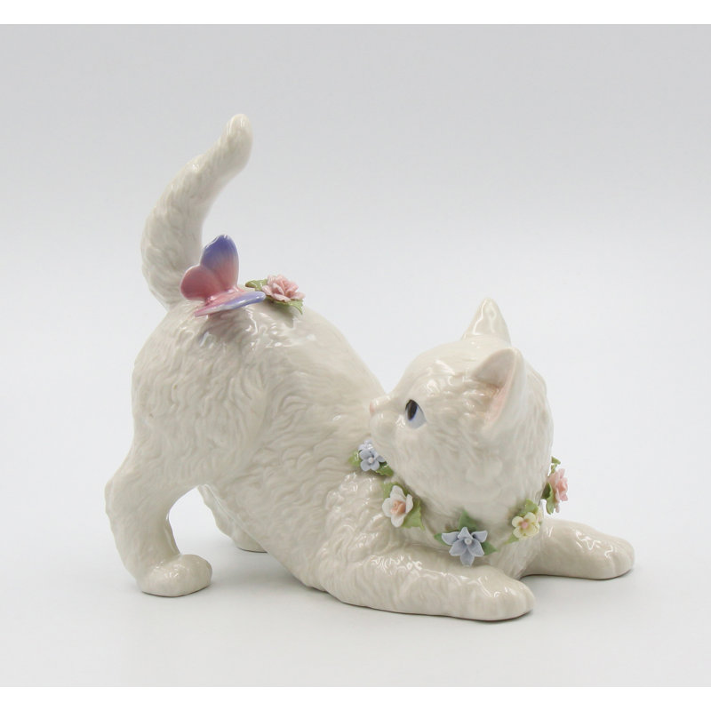 Figurine musicale chat avec papillon