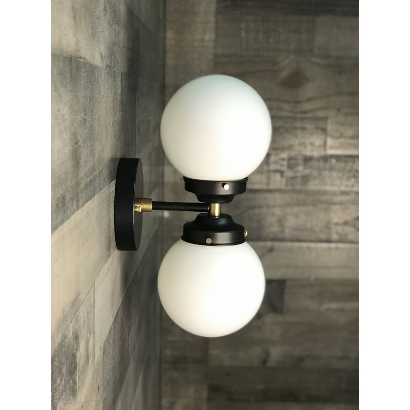 Rada Armed Sconce, Brass Black, White