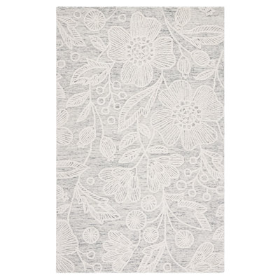 Tapis floral en laine touffeté à la main