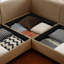 Canapé modulaire en L en chenille avec repose-pieds et rangement caché Rohan
