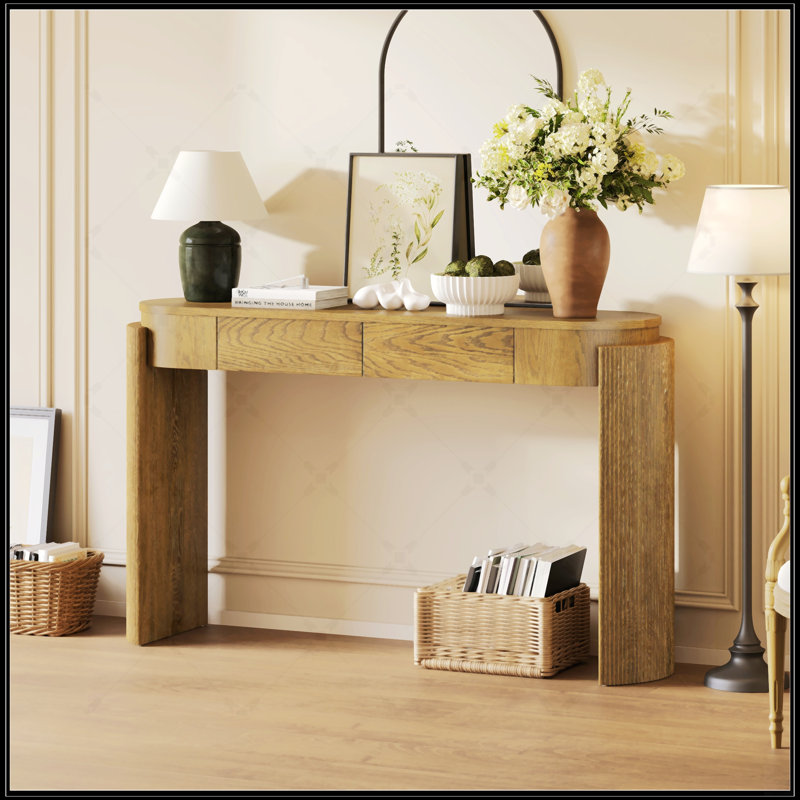 Table d'entrée en grain de bois naturel avec pieds cannelés, plateau ovale et 2 tiroirs pour un rangement et une présentation élégants