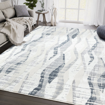 Tapis abstrait beige / bleu Aerith