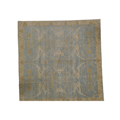 Tapis bleu clair et crème noué à la main de haute qualité