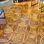 Carreaux de terrasse imbriqués en bois d'acacia massif, plancher extérieur à motif diagonal de 12 po x 12 po pour patio, balcon et bord de piscine (paquet de 10) - Résistant aux intempéries, imperméable et antidérapant - Installation facile à verrou, aucun outil nécessaire