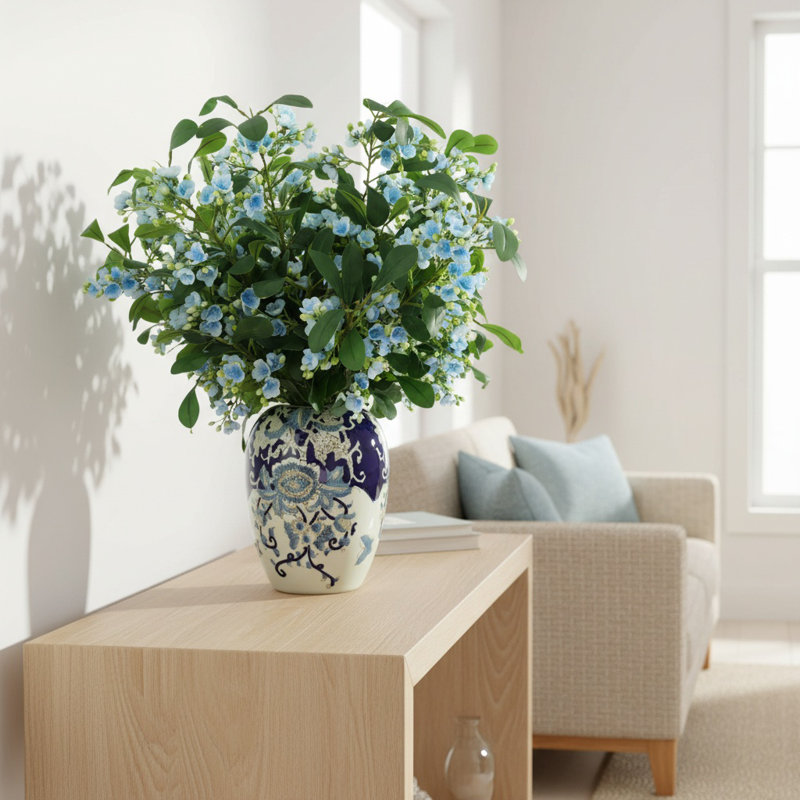 Tiges en herbe dans un vase décoratif, Bleu