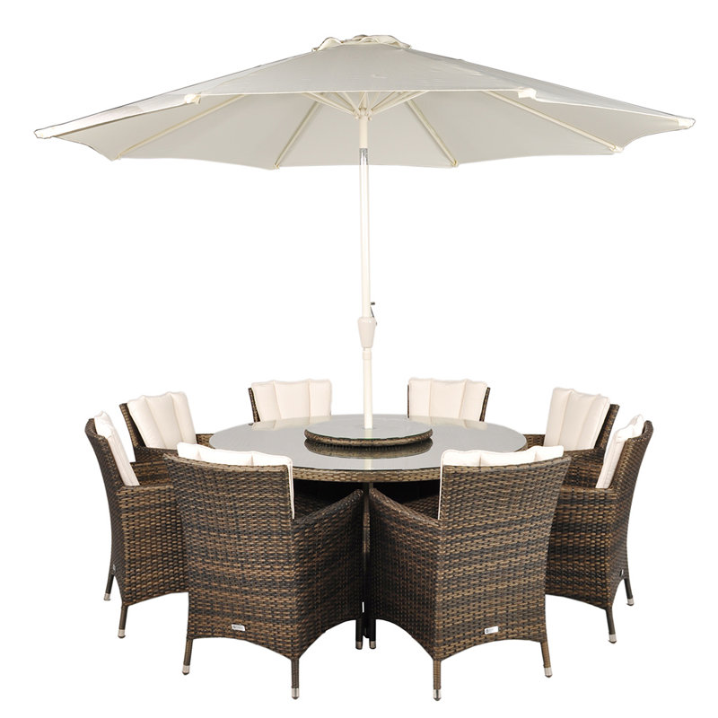 Harold 8 - Person Wicker Patio Dining Set with Round Table , Cushions Included